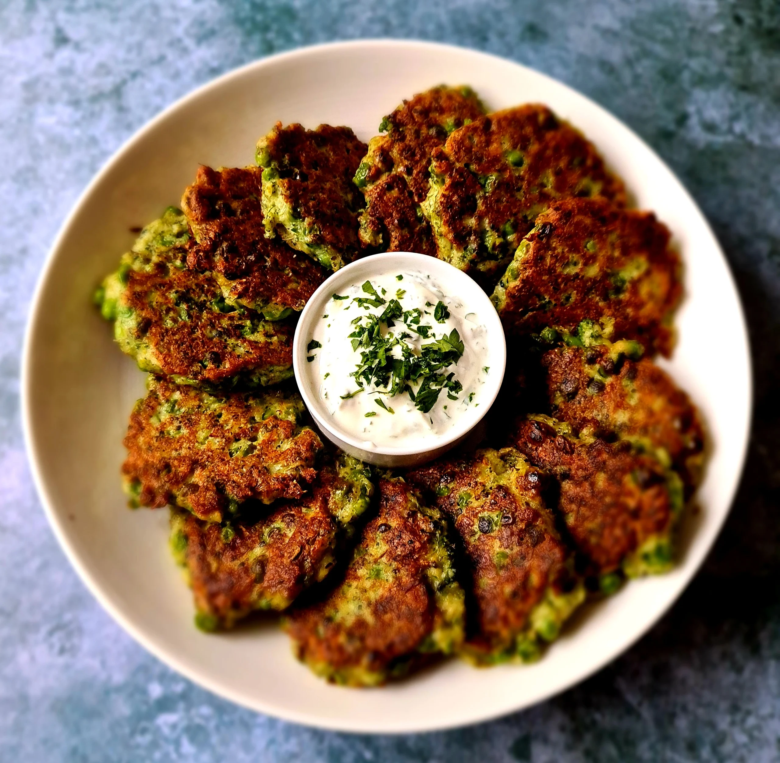 Pea, Broccoli & Parmesan herbed fritters with parsley dipping yoghurt! - At Dad's Table